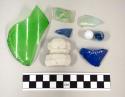 Pieces of miscellaneous glass, including 2 marbles; ironstone handle; opaque blu