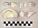 Plain creamware basal and body sherds, including 1 handle fragment