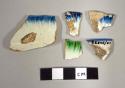 Featheredge china sherds; 4 blue and white, 1 green and white