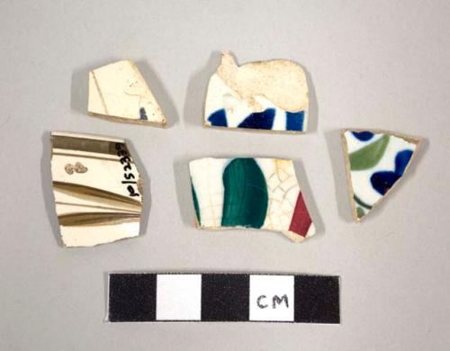 Handpainted creamware body sherds, including one peachblow