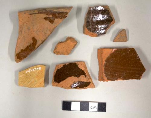 Lead glazed earthernware sherds, one side glazed