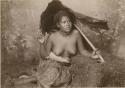 Samoan woman, posed, holding via leaf over her shoulders