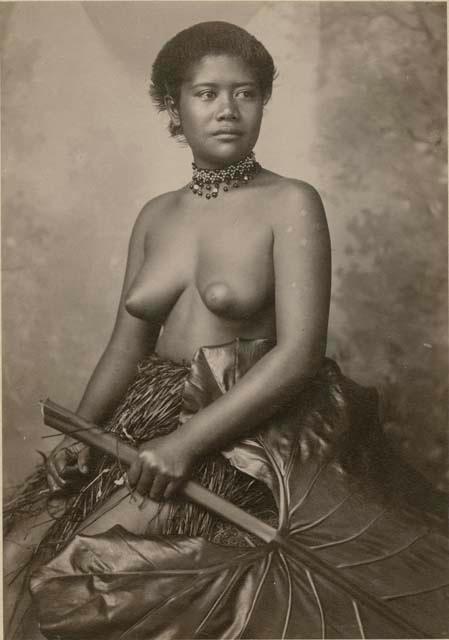 Samoan woman, posed, holding leaf