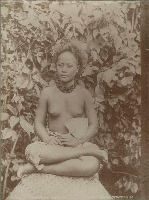 Leata, a Samoan woman, posed holding a fan.