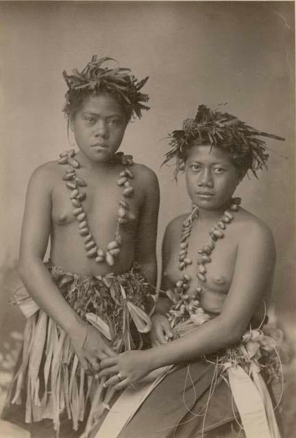 Young Samoan woman and girl, posed studio portrait