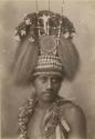 Samoan man wearing chiefly headdress, studio portrait