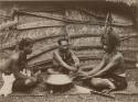 Three Samoan men making Kava