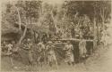 Samoan group, men aiming rifles