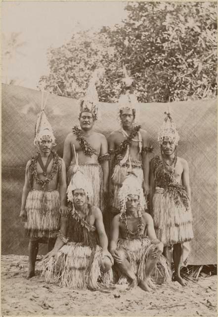 Group portrait, men in ceremonial dress