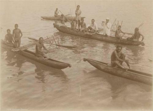 Groups of men in canoes