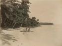 Beach scene, people in canoes