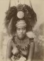 Samoan woman wearing a headdress, studio portrait