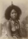 Samoan woman wearing hair decoration, studio portrait