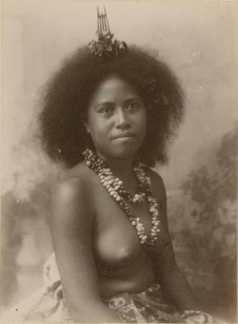 Samoan woman wearing hair decoration, studio portrait