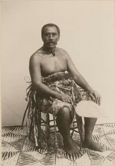 Seumanutafa, seated holding fan, portrait