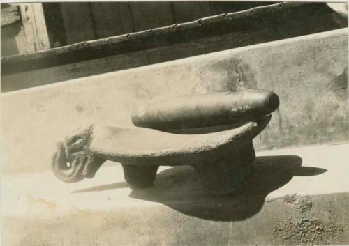 Metate and brazo