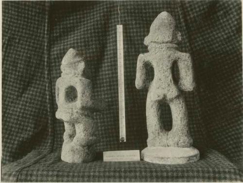Stone figures, back view