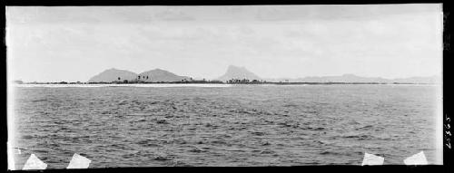 Aukena Island, with Mount Duff on Mangareva Island to right