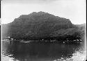 Boats and buildings along shoreline, with Mount Duff in background