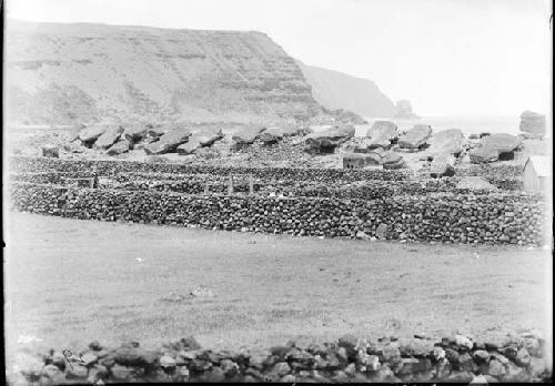 Moai face down on large platform at Tongariki