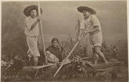 Two men and a woman in boat