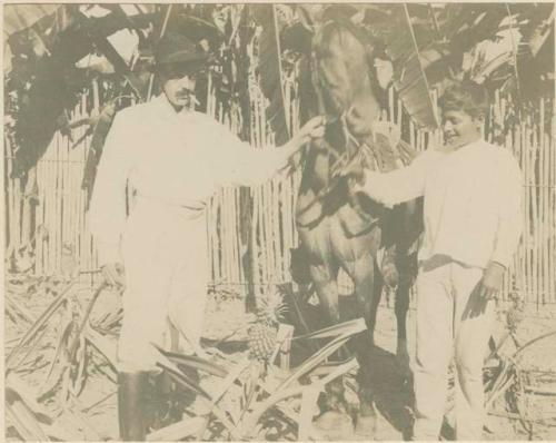 Man, boy and horse at Mahogany Camps