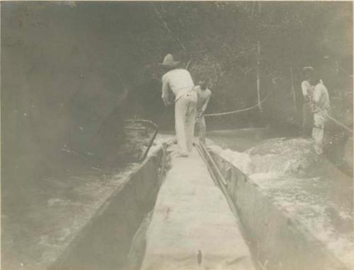 Mahogany Camps -- men working