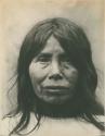 Frontal facial portrait of a Trique woman