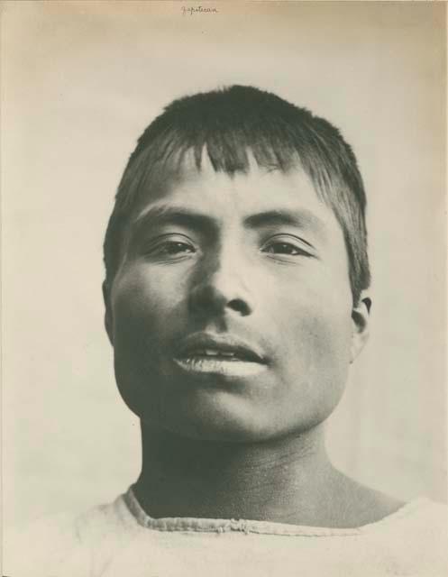 Frontal facial portrait of a Trique man