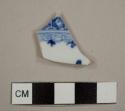 Asian porcelain fragment with blue handpainted decoration on interior