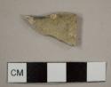 Burned white salt-glazed stoneware rim sherd, Royal Pattern