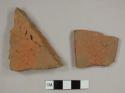 Brick fragments, possibly from roof tiles