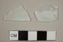 Flat glass fragments, deteriorating or frosted