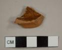 Red lead-glazed redware base sherd to a possible mug