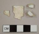 Two pearlware sherds and two possible ironstone sherds