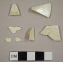 Creamware sherds, including two plate rims
