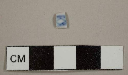 Asian porcelain sherd with handpainted blue decoration on both sides