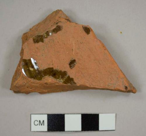 Lead-glazed redware base sherd