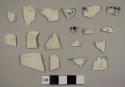 Pearlware sherds, including nine with blue feathered edging and nine plain sherds