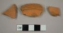 Unglazed red earthenware sherds, including one base, possibly to a flower pot or bowl