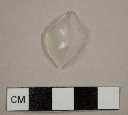 Colorless bottle glass, possibly a shoulder fragment