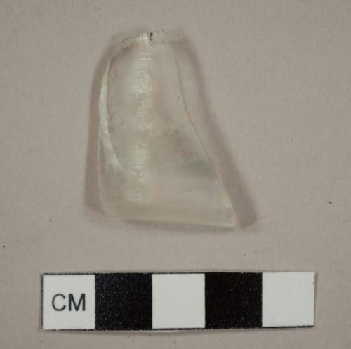 Colorless glass base fragment, possibly to a tumbler