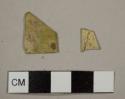 Delaminating green flat glass fragments