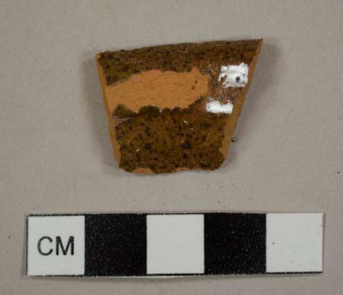 Lead-glazed red earthenware handle fragment, possibly from a jug or pitcher