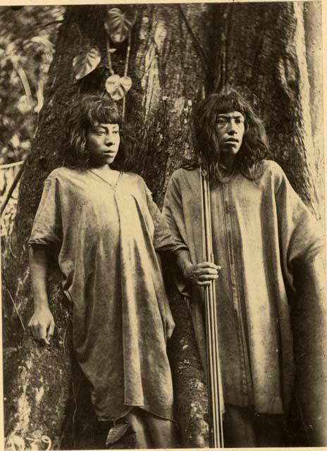 Man and woman holding bow and arrows