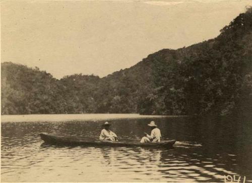 Two men in a canoe