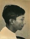 Profile portrait of a Maya boy