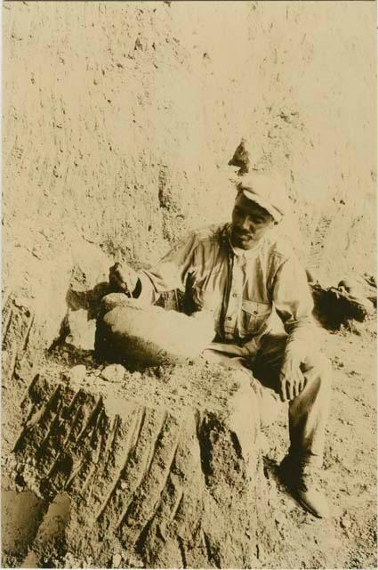 Batab Singh at work on a broken olla in situ