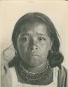 Frontal facial portrait of a Tarascan woman