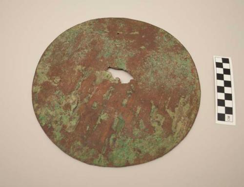 Broken copper disc